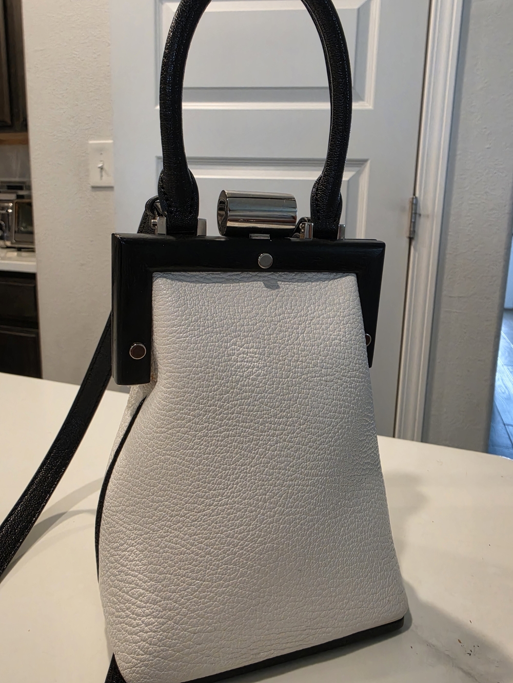 Perrin Paris White and Black Perrin Mini Bag Top-Handle Bag Goatskin Leather